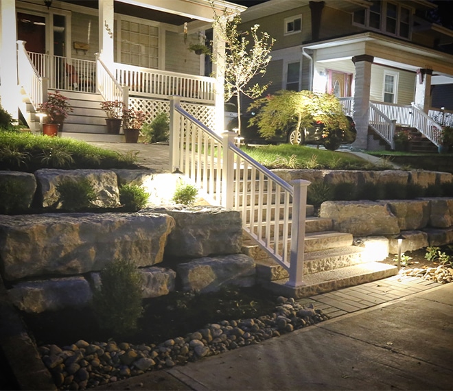 Rock retaining wall landscaping installation around Centerville, Ohio.